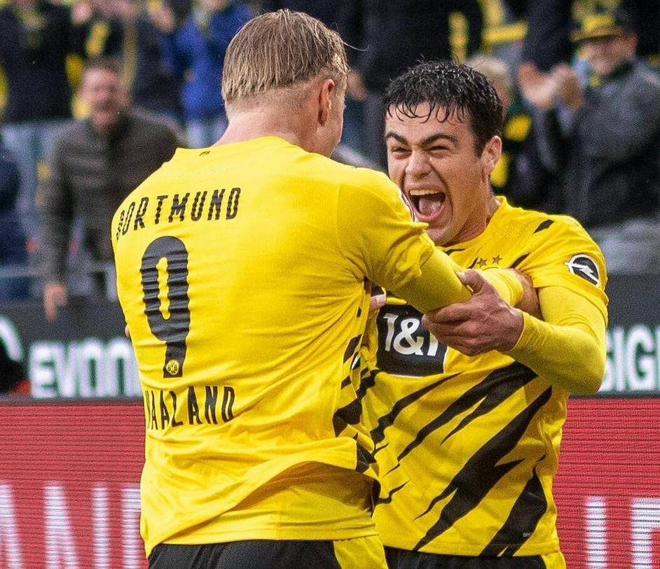  哈兰德戴帽破纪录助多特登顶积分榜  